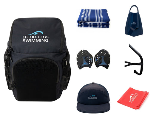 The Full Swim Bag — backpack, towel, navy fins, paddles, snorkel, running cap, resistance band